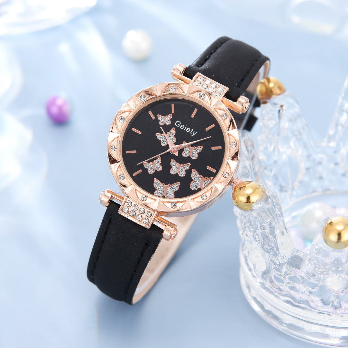 Elegant dameshorloge met vlinderdetail