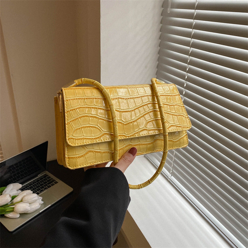 Trendy compacte draagbare schoudertas