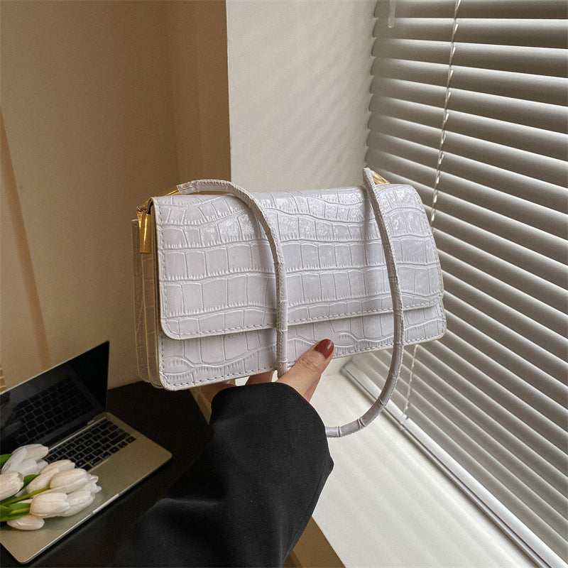 Trendy compacte draagbare schoudertas
