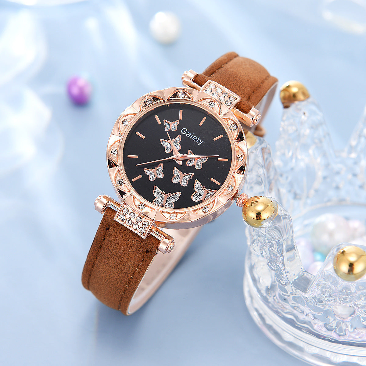 Elegant dameshorloge met vlinderdetail